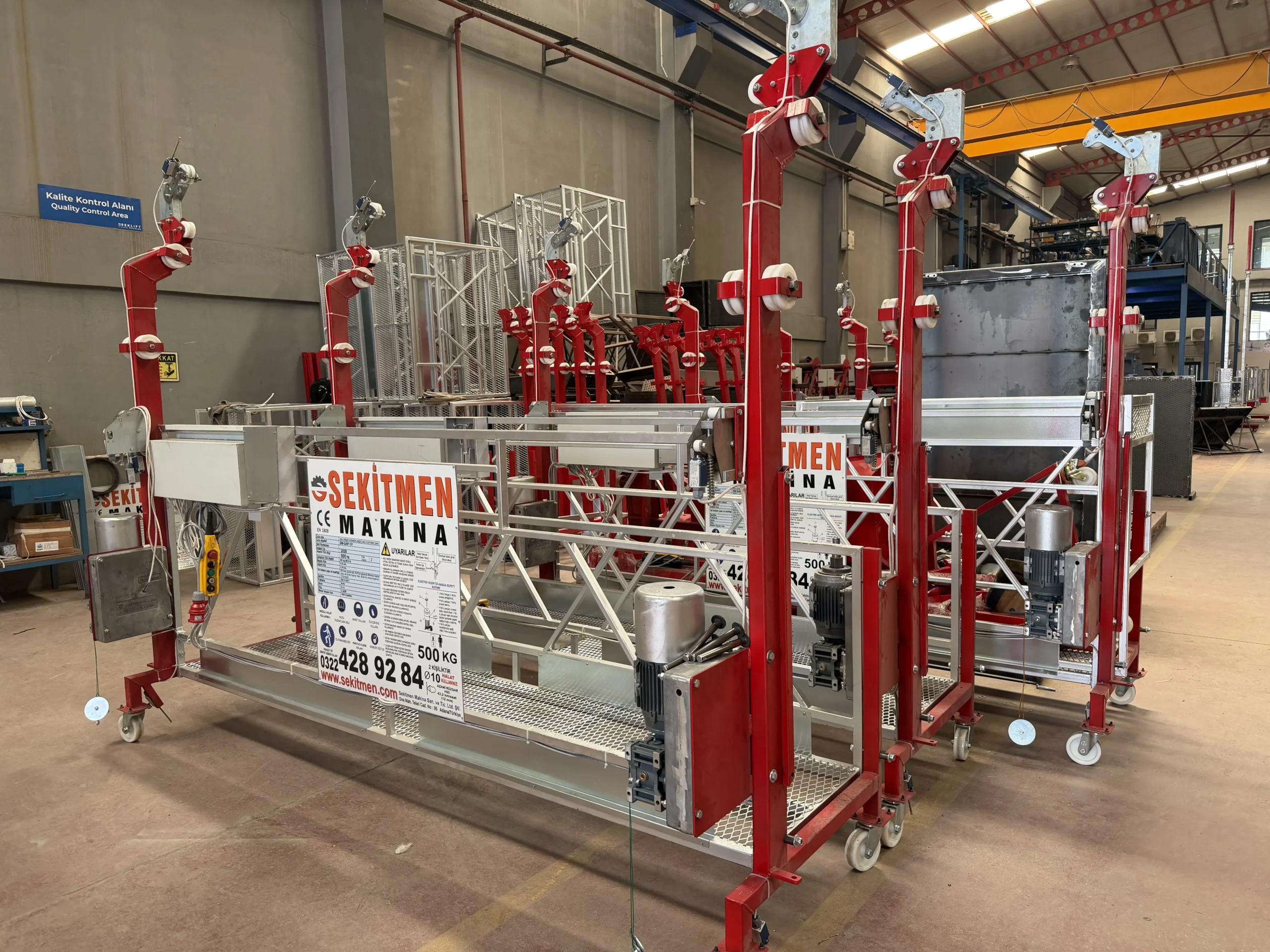 Multiple SEKLIFT SM-GAP-101 electric suspended platforms prepared inside the factory