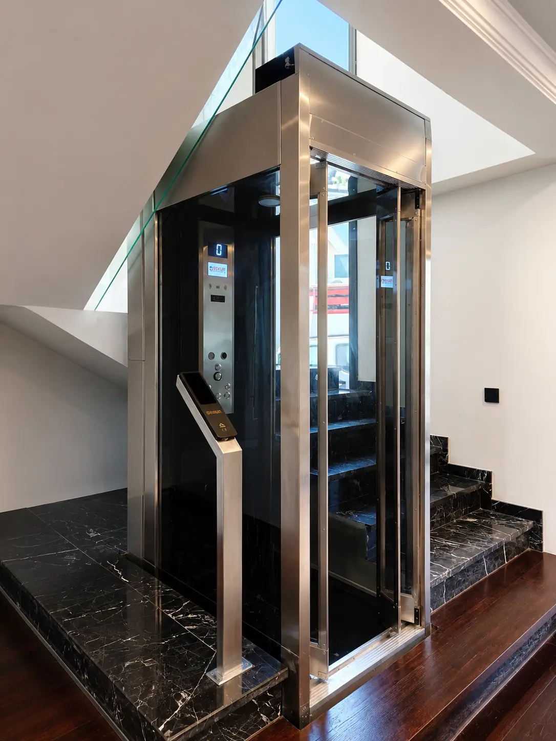 SEKLIFT bespoke glass architectural lift integrated into a premium residential interior